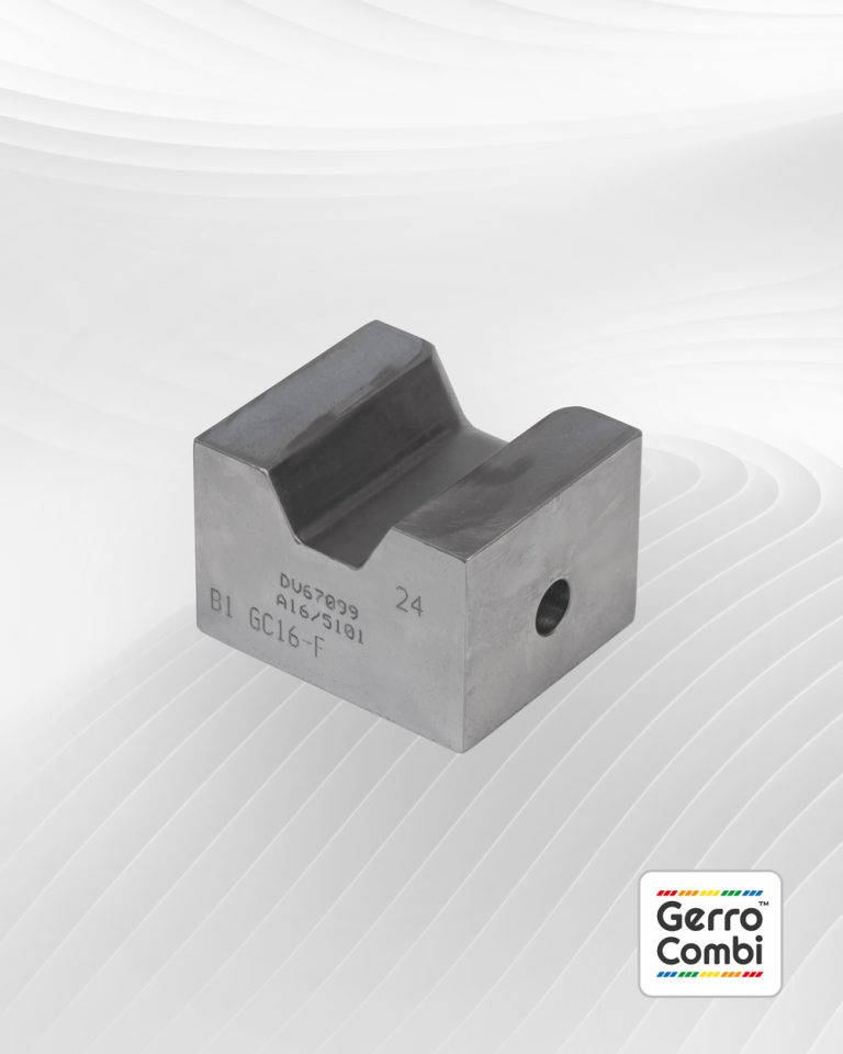 The bottom part of a swaging die set featuring engraved numbers and letters on its surface. The textured, wavy background pattern highlights a "Gerro™ Combi" logo in the bottom right corner. The piece appears to be part of the Talurit Group's specialized wire rope ferrules. © Copyright Talurit AB. All rights reserved.