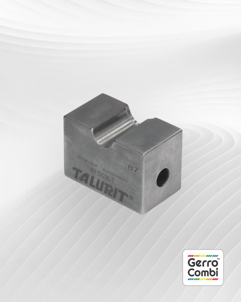 A Gerro™ Combi Die set, essential for the mechanical splicing in the Gerro™ Combi system. The die has "TALURIT" engraved on its side and a "Gerro™ Combi" logo set against a wavy white backdrop in the bottom-right corner of the image. © Copyright Talurit AB. All rights reserved.