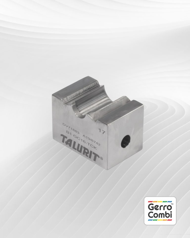 Image of a Gerro™ Combi Die set is displayed on a light background with subtle white waves. This essential component for wire rope equipment is engraved with text, including "TALURIT" and other specifications. In the bottom right corner, there is a Gerro Combi™ logo with colored stripes. © Copyright Talurit AB. All rights reserved.