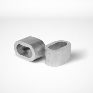 Two short eye ferrules are positioned on a white surface. The aluminium ferrules feature smooth surfaces and precise edges, indicating they might be parts of a larger assembly or construction component for combination wire rope systems. © Copyright Talurit AB. All rights reserved.