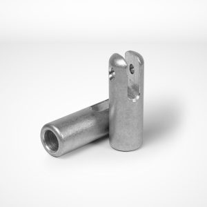 Two fork ferrules feature a U-shaped open end and a through-hole near the top. Positioned on a white background, one component stands upright while the other lies horizontally next to it. © Copyright Talurit AB. All rights reserved.