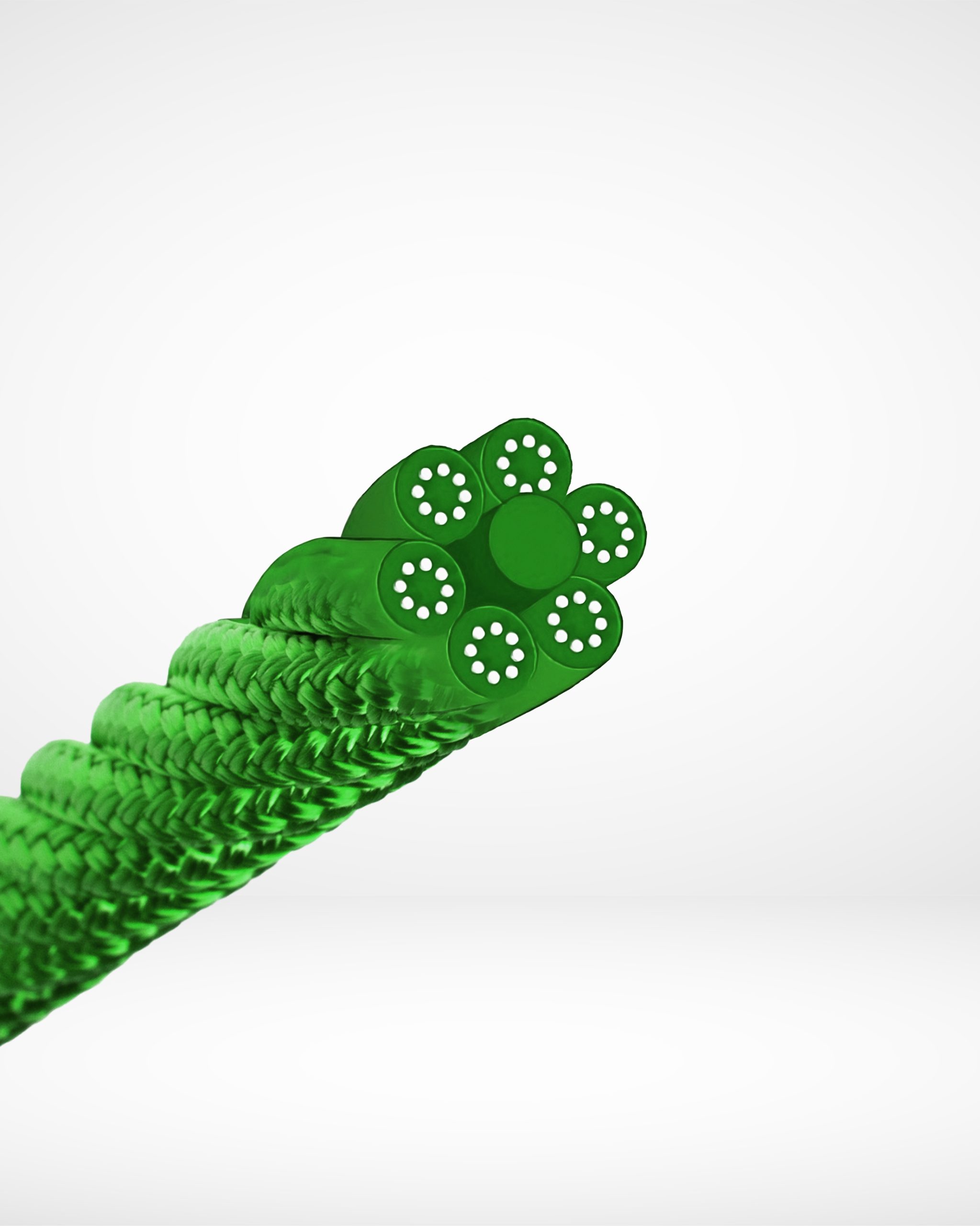 Talurit® Close-up image of the RMU - Combination Wire Rope Multi in green, showcasing multiple smaller insulated wires at its cut end, akin to intricate wire rope equipment. The background features a plain white gradient. © Copyright Talurit AB. All rights reserved.