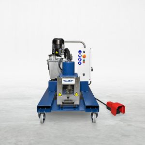 Talurit® The LK 45 1VW - Cutting Machine is a compact industrial device featuring a blue base and metallic components, specifically designed for swagers. It comes with wheels for easy mobility and various control buttons on a white panel. Additionally, it has a red safety switch connected by a cord positioned on the right side, making it ideal for efficient mechanical splicing of wire rope. © Copyright Talurit AB. All rights reserved.