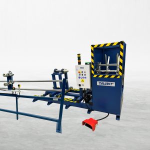 Talurit® A "Talurit" branded industrial machine, the UL 5000/400 - Coiling Machine, is depicted in blue with yellow and black caution markings. It features a control panel with buttons and indicators, a foot pedal, and integrated machinery for mechanically splicing wire rope. Ferrules are visible on the processing unit against a plain white background. © Copyright Talurit AB. All rights reserved.